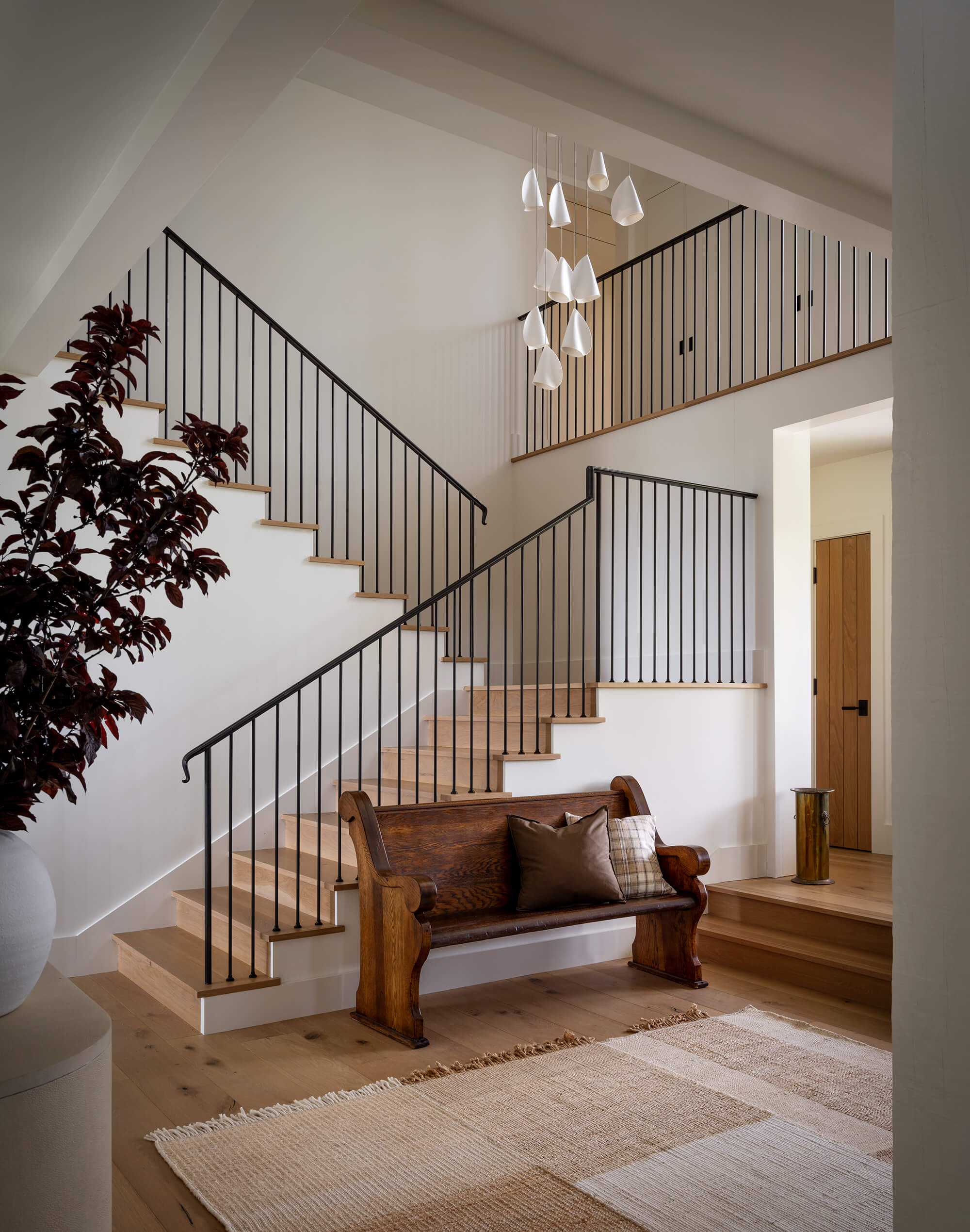 California Home Interior Design Entry with Wrought Iron Banister